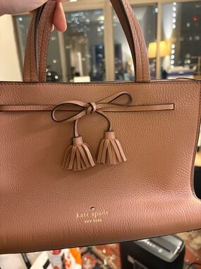 Kate Spade Tan Genuine Leather Handbag with Tassel detailing